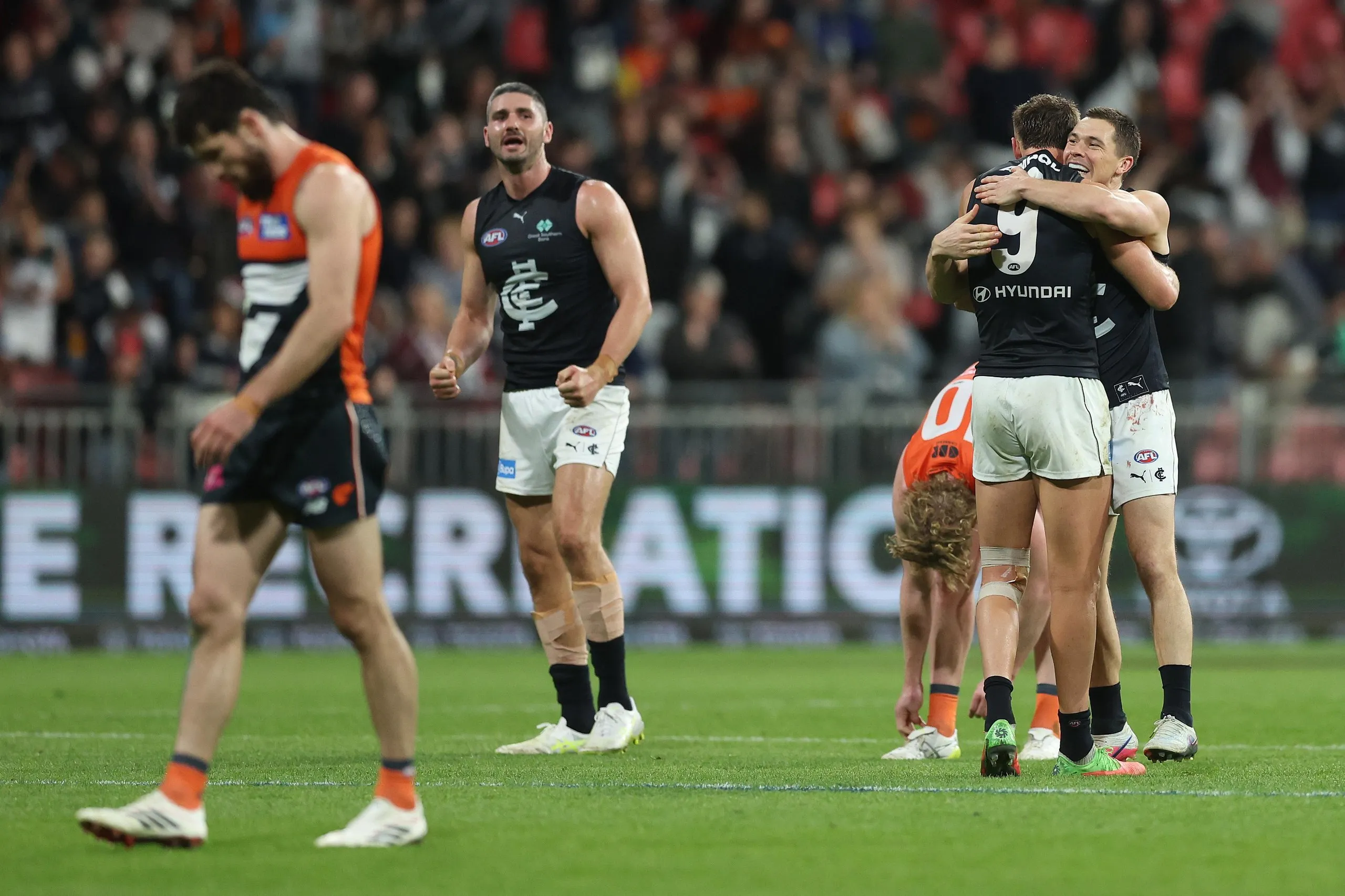 Carlton Blues celebrate victory over Greater Western Sydney Giants
