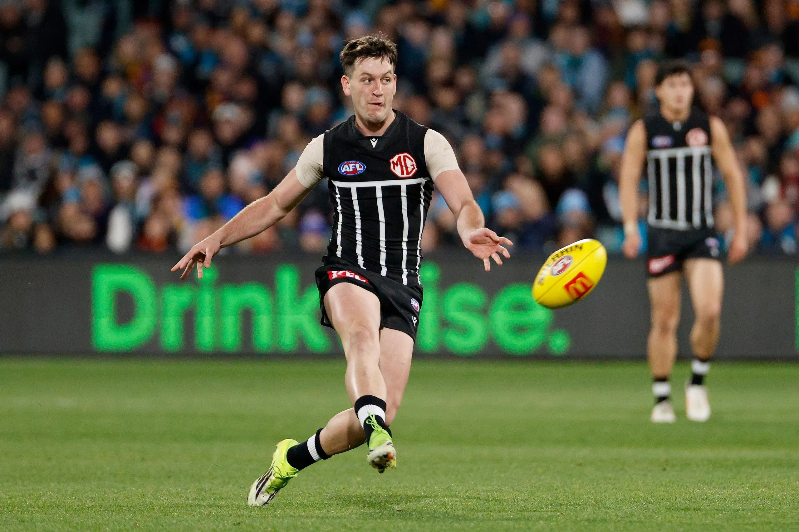 Zak Butters fires off a kick at Adelaide Oval