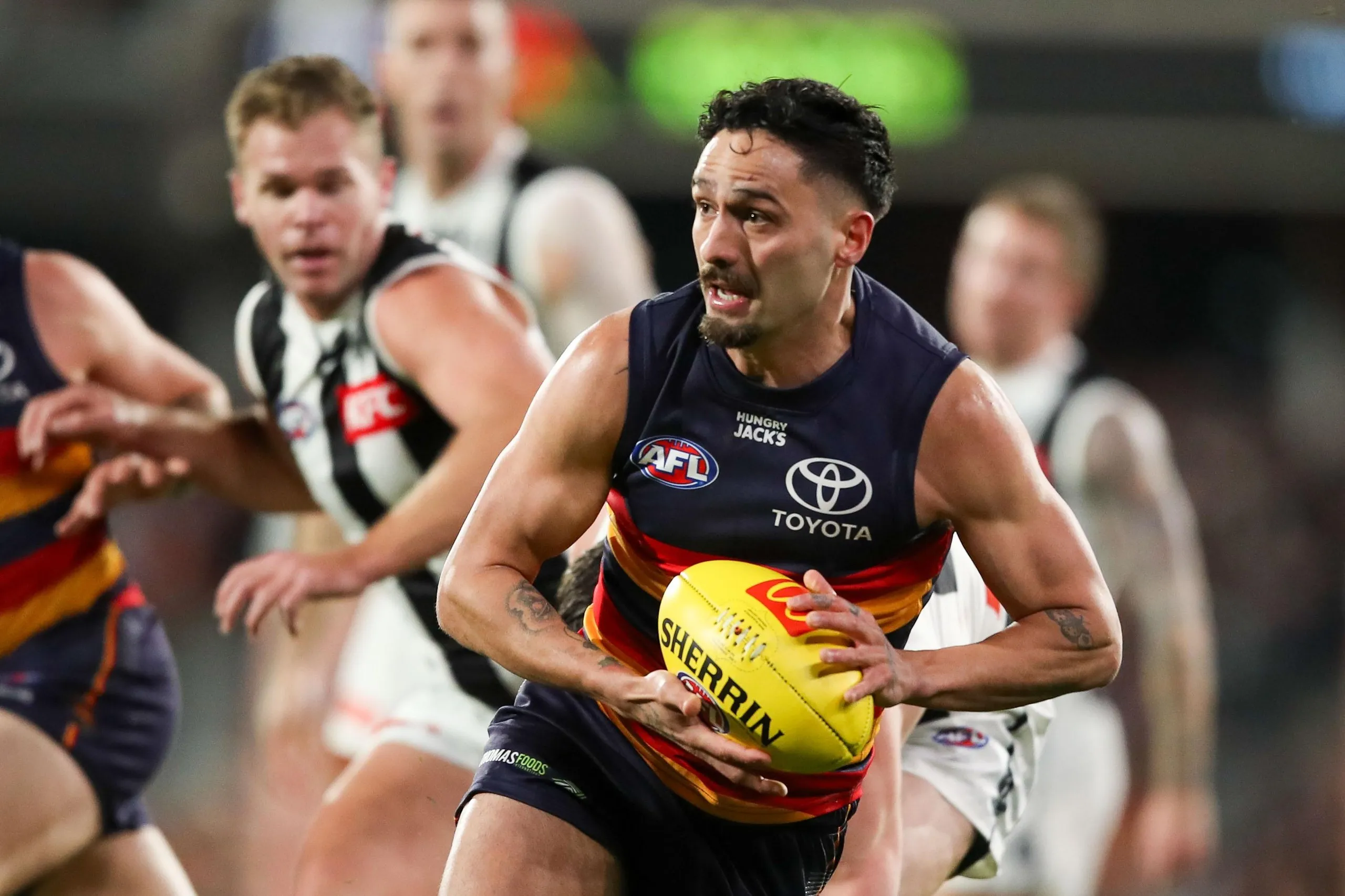 Izak Rankine in action for the Crows against Collingwood