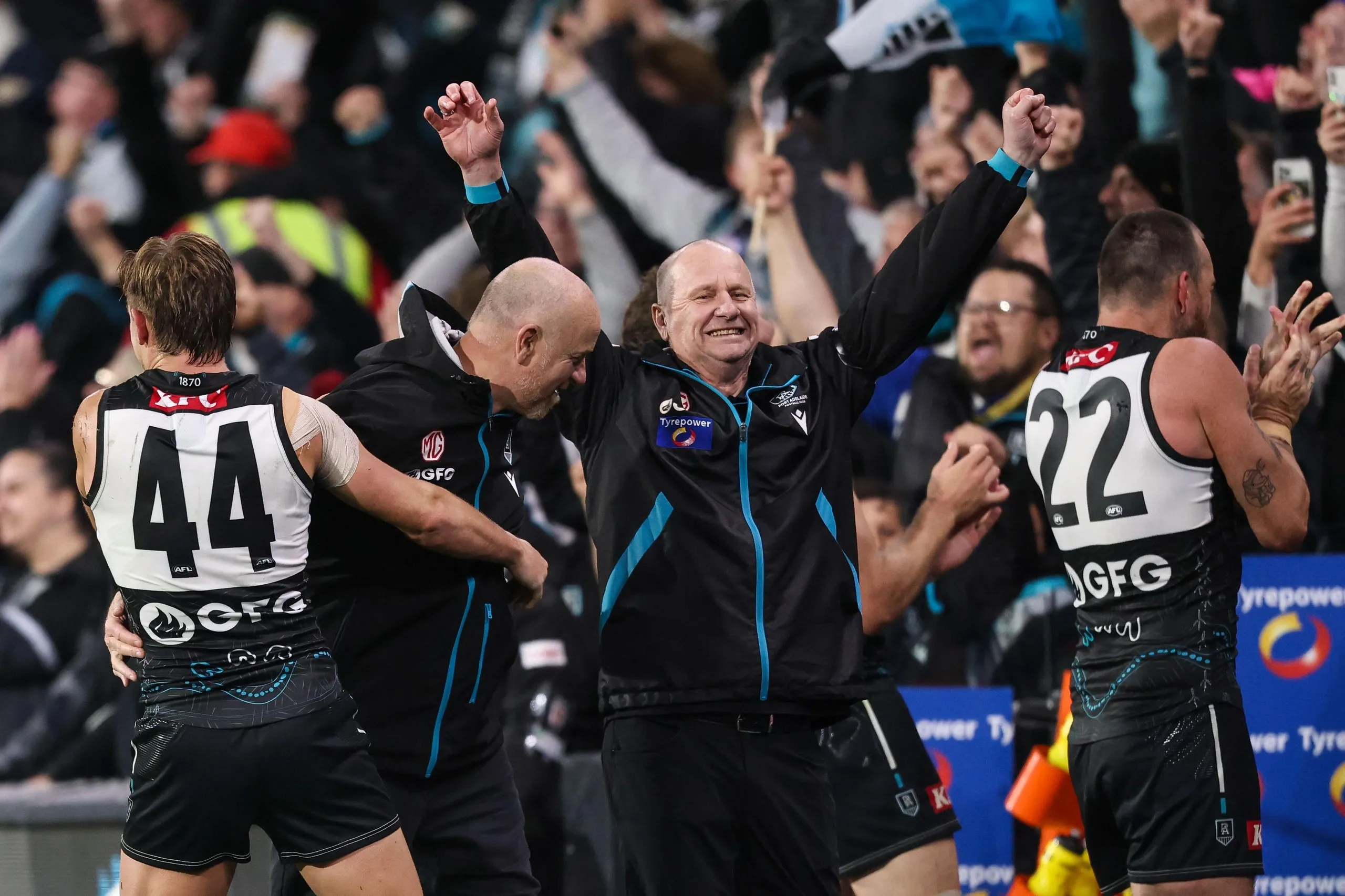 Ken Hinkley celebrates after Port Adelaide beat Hawthorn at the Adelaide Oval 2024