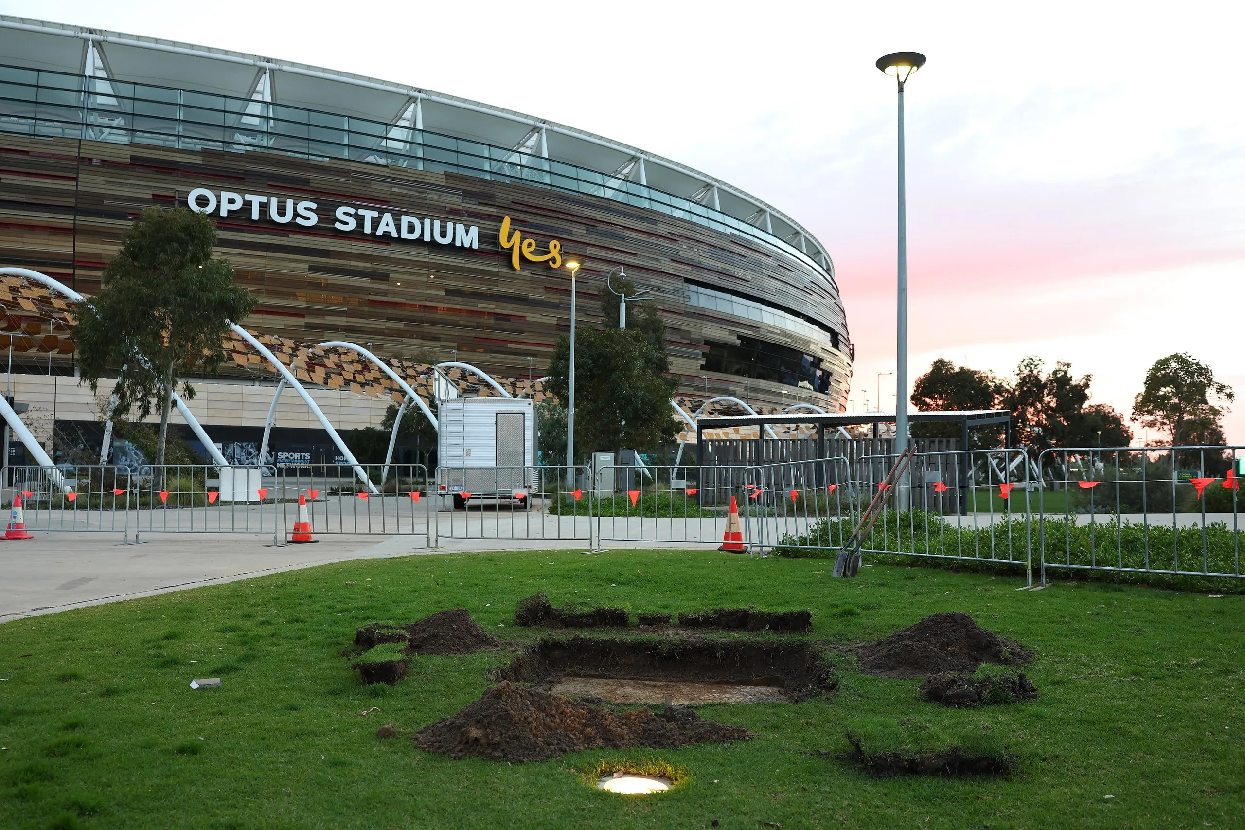 A depression in the turf remains after the statue was removed.