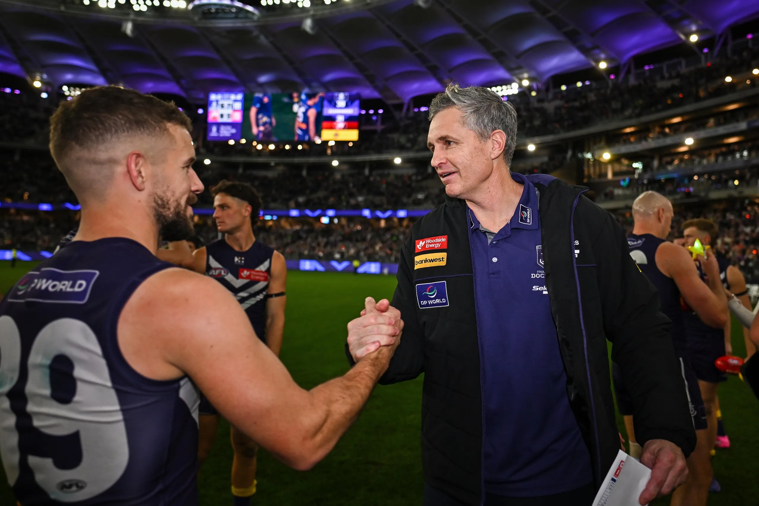 Justin Longmuir celebrates after Fremantle defeat Sydney at Optus Stadium
