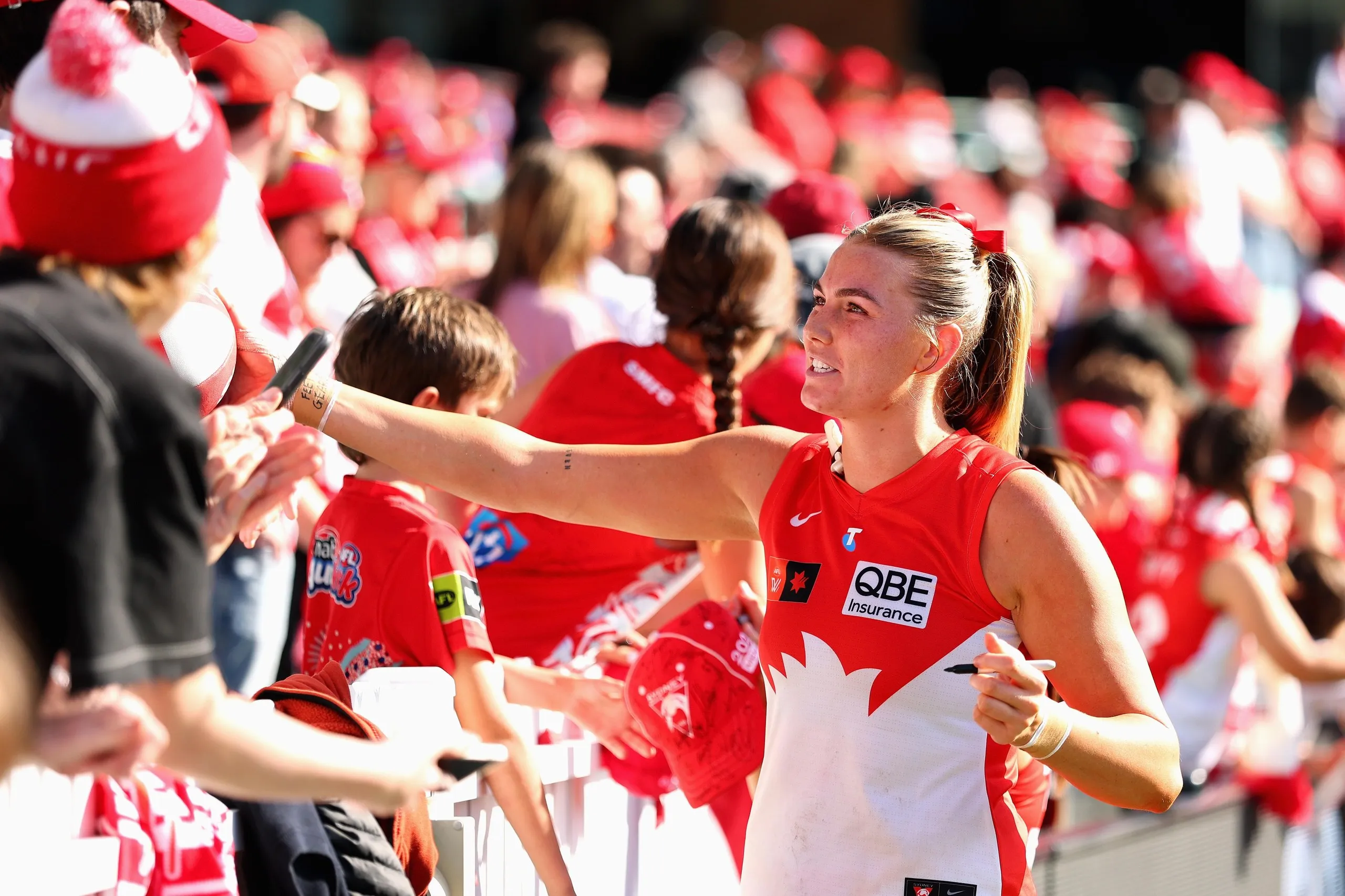 Ally Morphett meets fans after the Swans’ AFLW win over Essendon on Sunday.