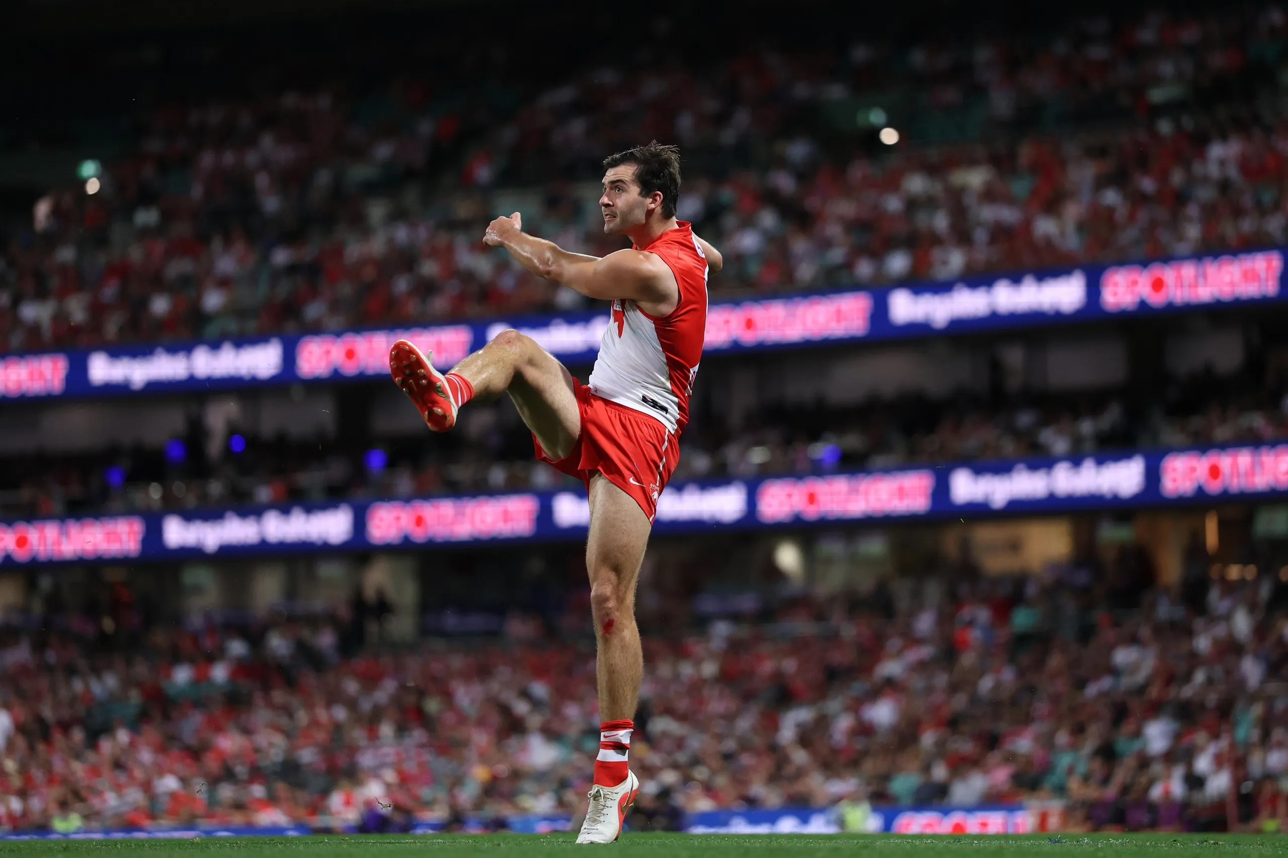 Logan McDonald kicks a goal