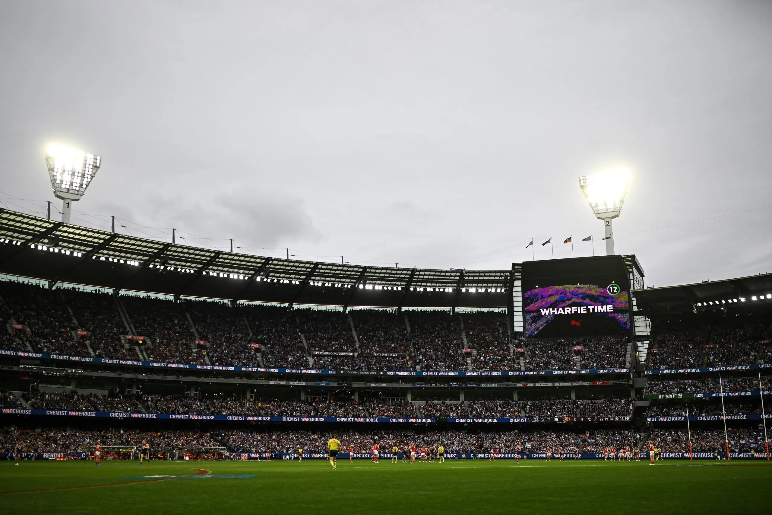 Wharfie Time is signalled on the MCG’s big screen.